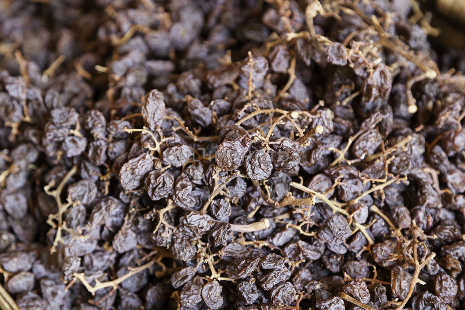 Raisins dried in a market, a detail of raisins, food healthy lifestyle
