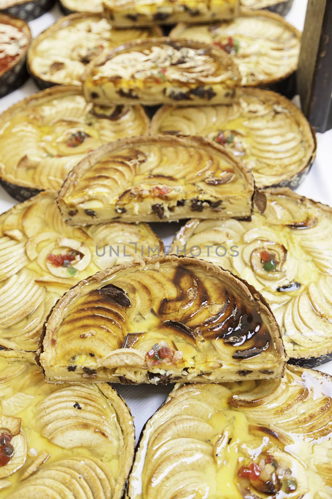 Apple pies in a market, a detail of homemade cakes in a traditional market in the city, baked sweet