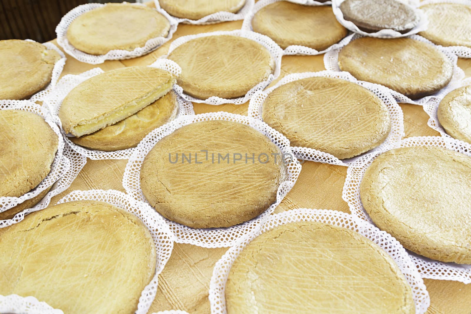 Typical Spanish cream homemade pie, a sweet dessert detail of artisan food in a street market