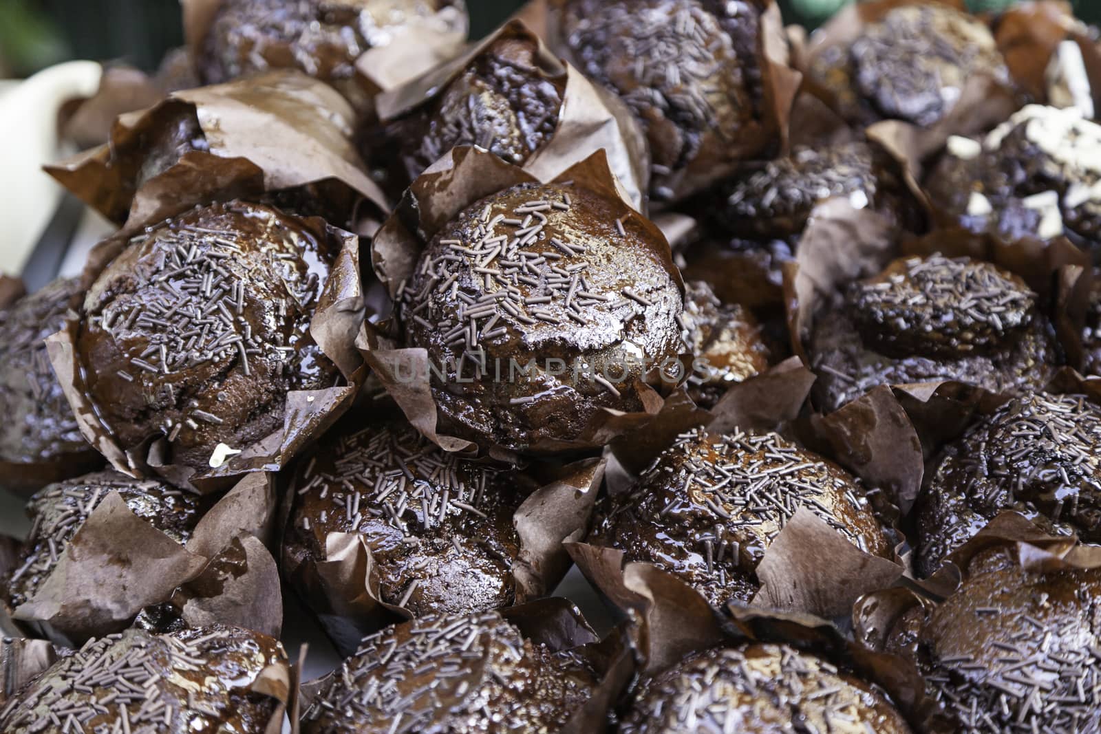 Homemade chocolate cupcakes, detail of a sweet dessert, traditional pastries