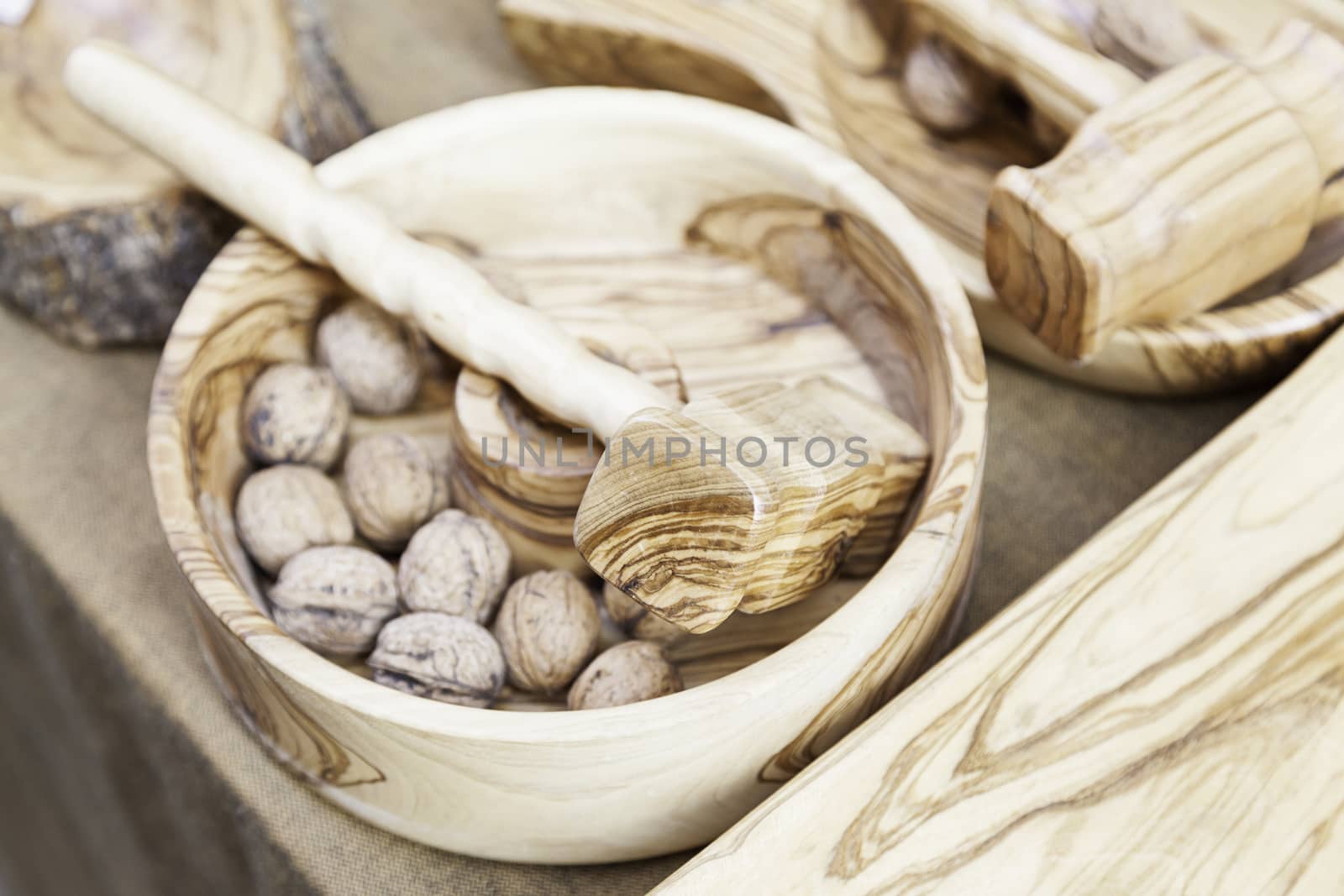 Wooden hammer for cracking nuts, detail of a tool to open nuts