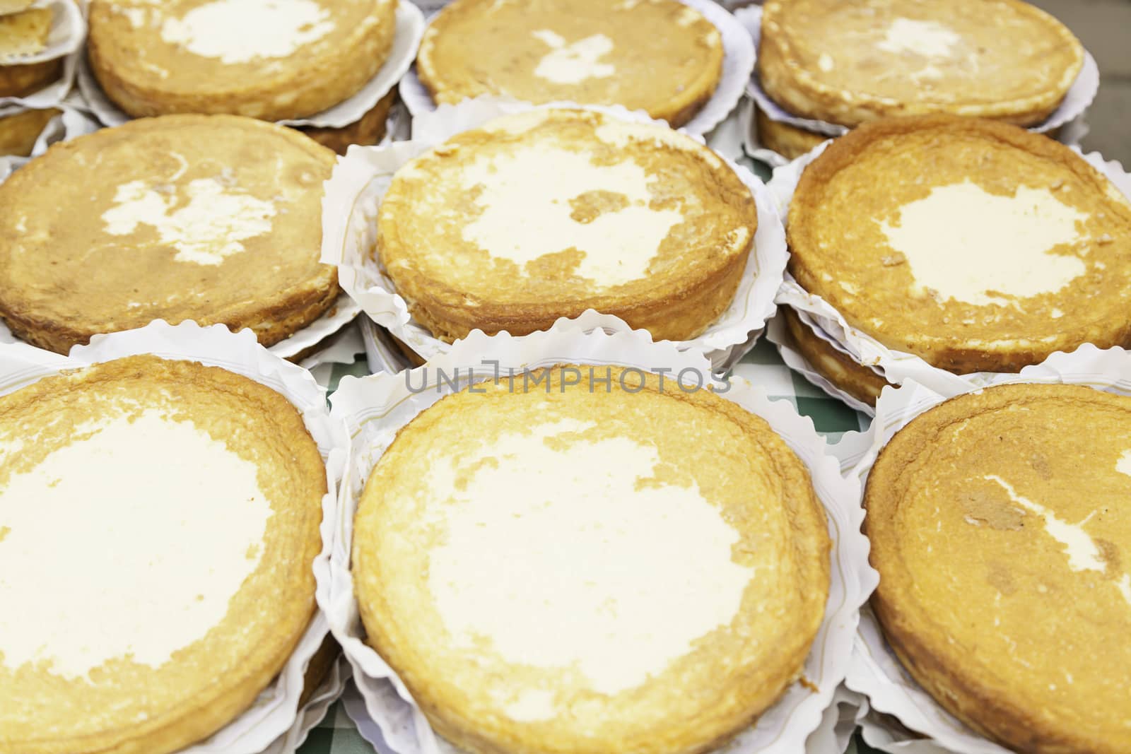Typical Spanish cream homemade pie, a sweet dessert detail of artisan food in a street market