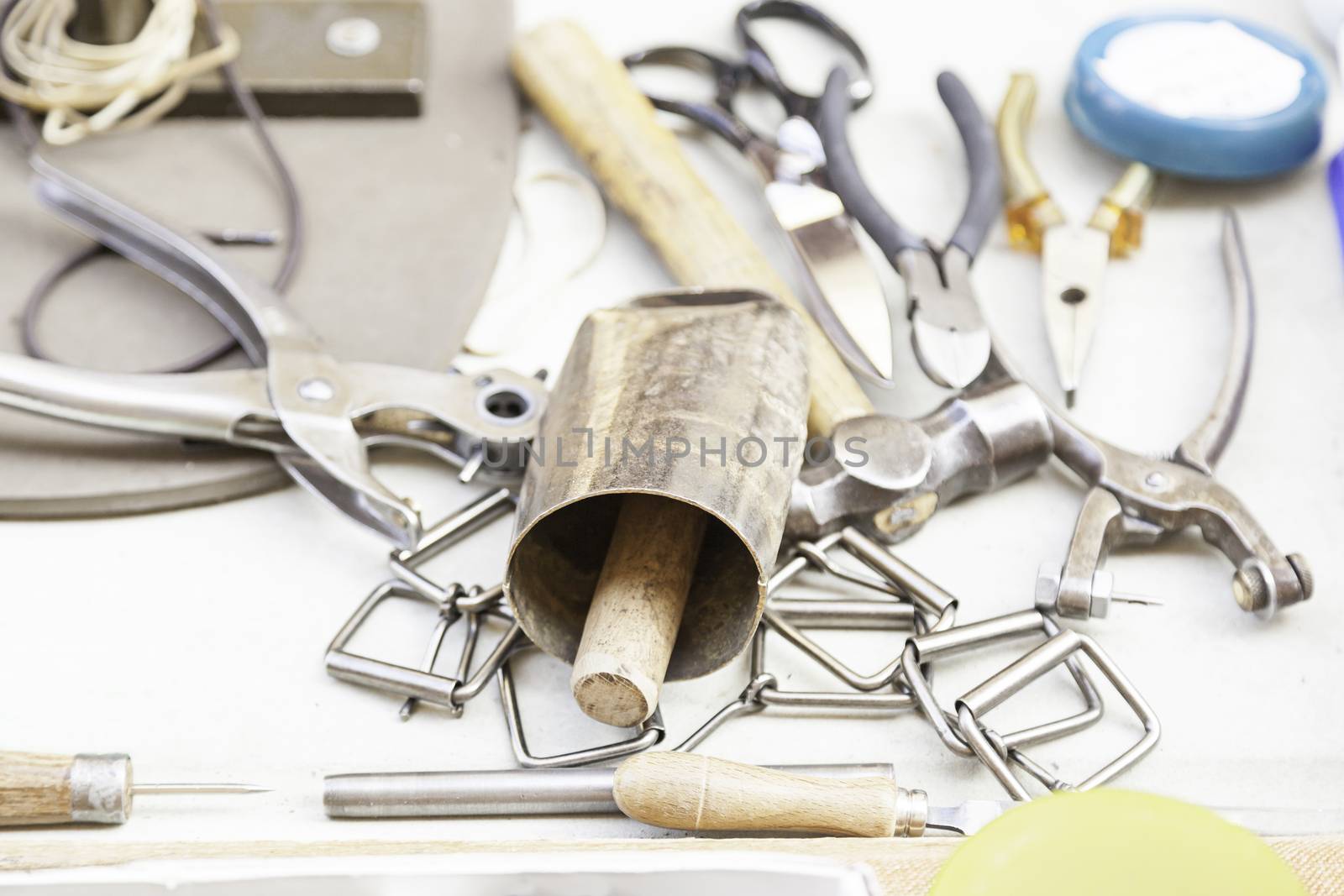 Making a metal cowbell, detail of a metal instrument, farm tools