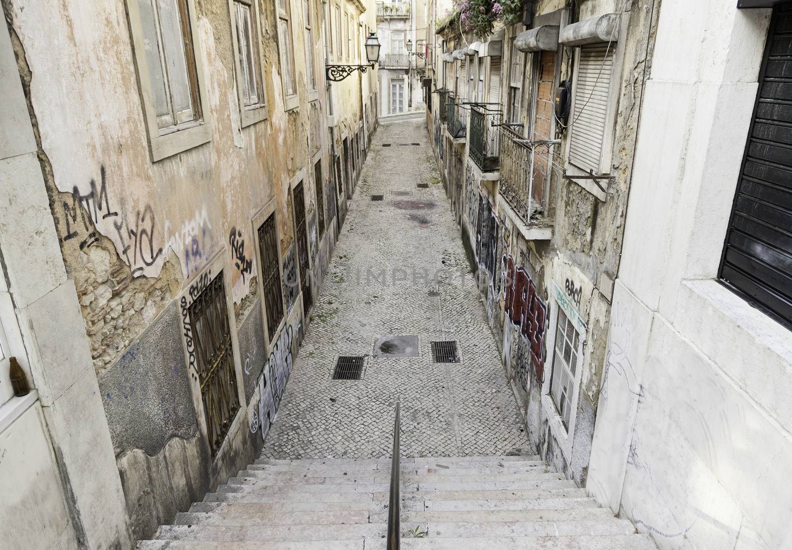 Old alley Lisbon, detail of a street in an old quarter of Lisbon, City Tours