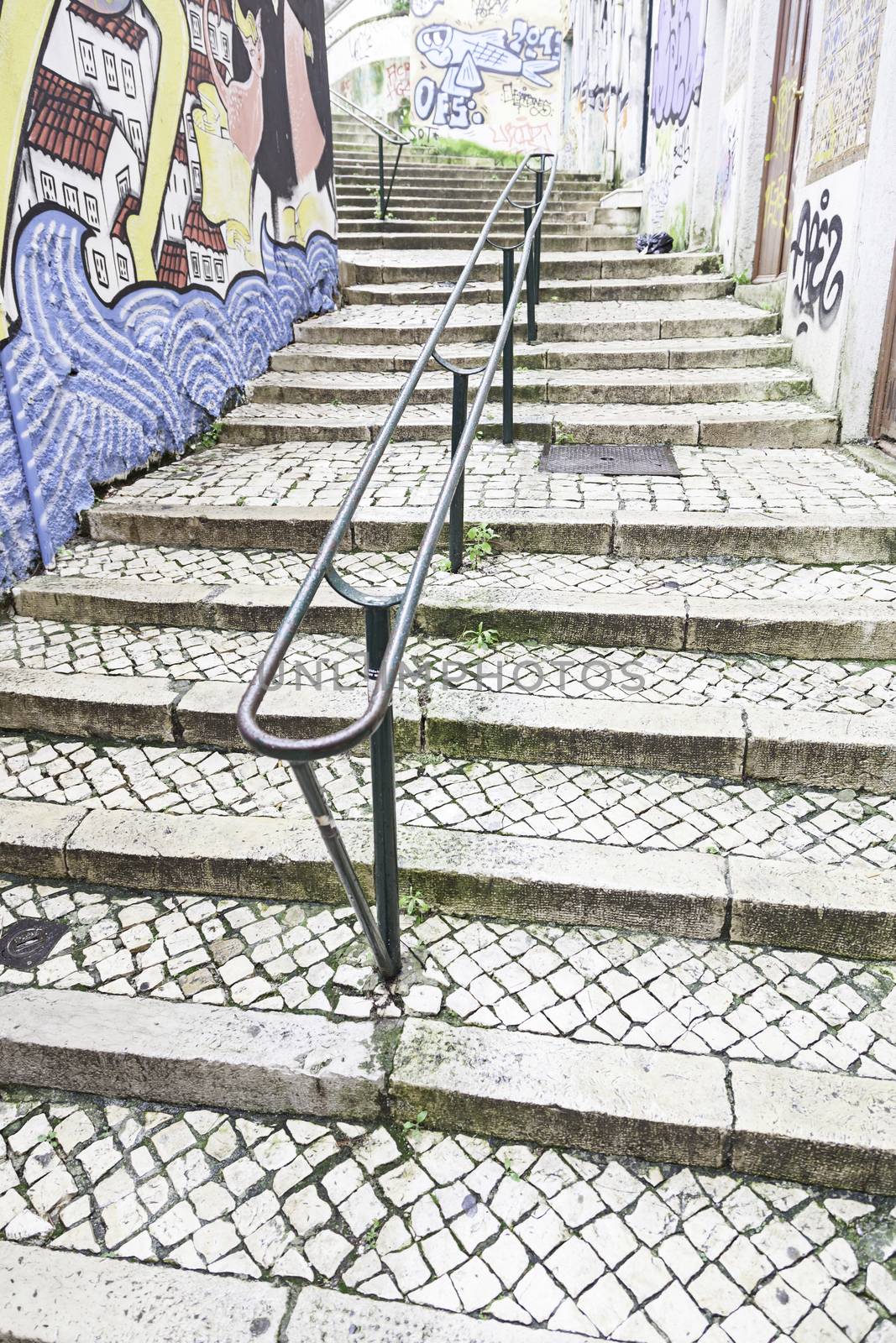 Stairs in Alfama district, Lisbon, detail of a old sclera in a typical neighborhood