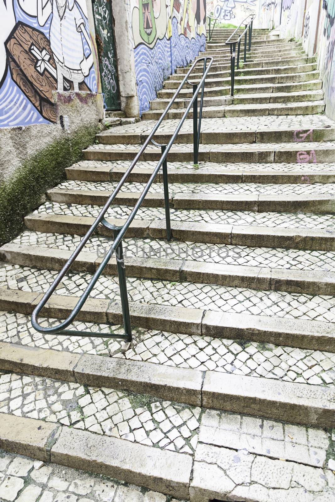 Stairs in Alfama district, Lisbon, detail of a old sclera in a typical neighborhood
