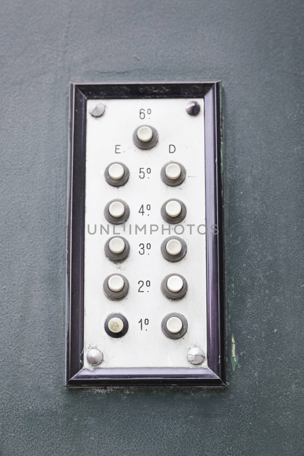Old intercom in a house, detail of a electric apparatus in the facade of a building