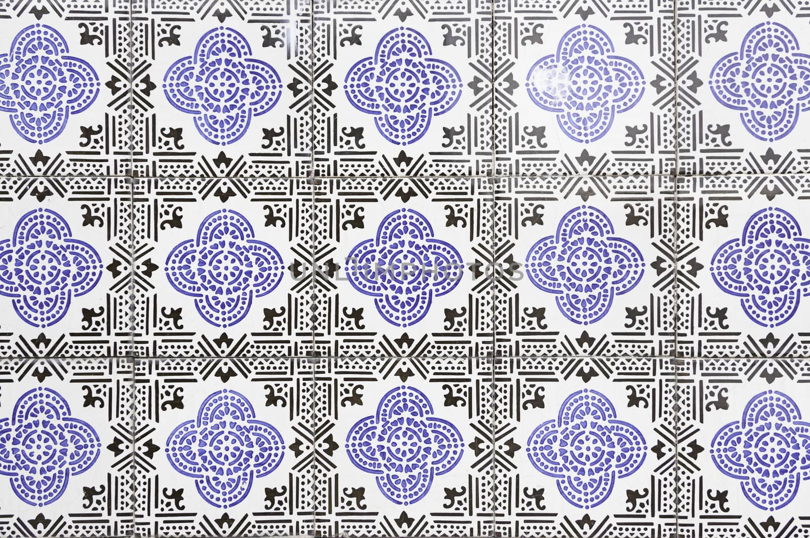 Typical old Lisbon tiles, detail of a classic ceramic tiles, art of Portugal