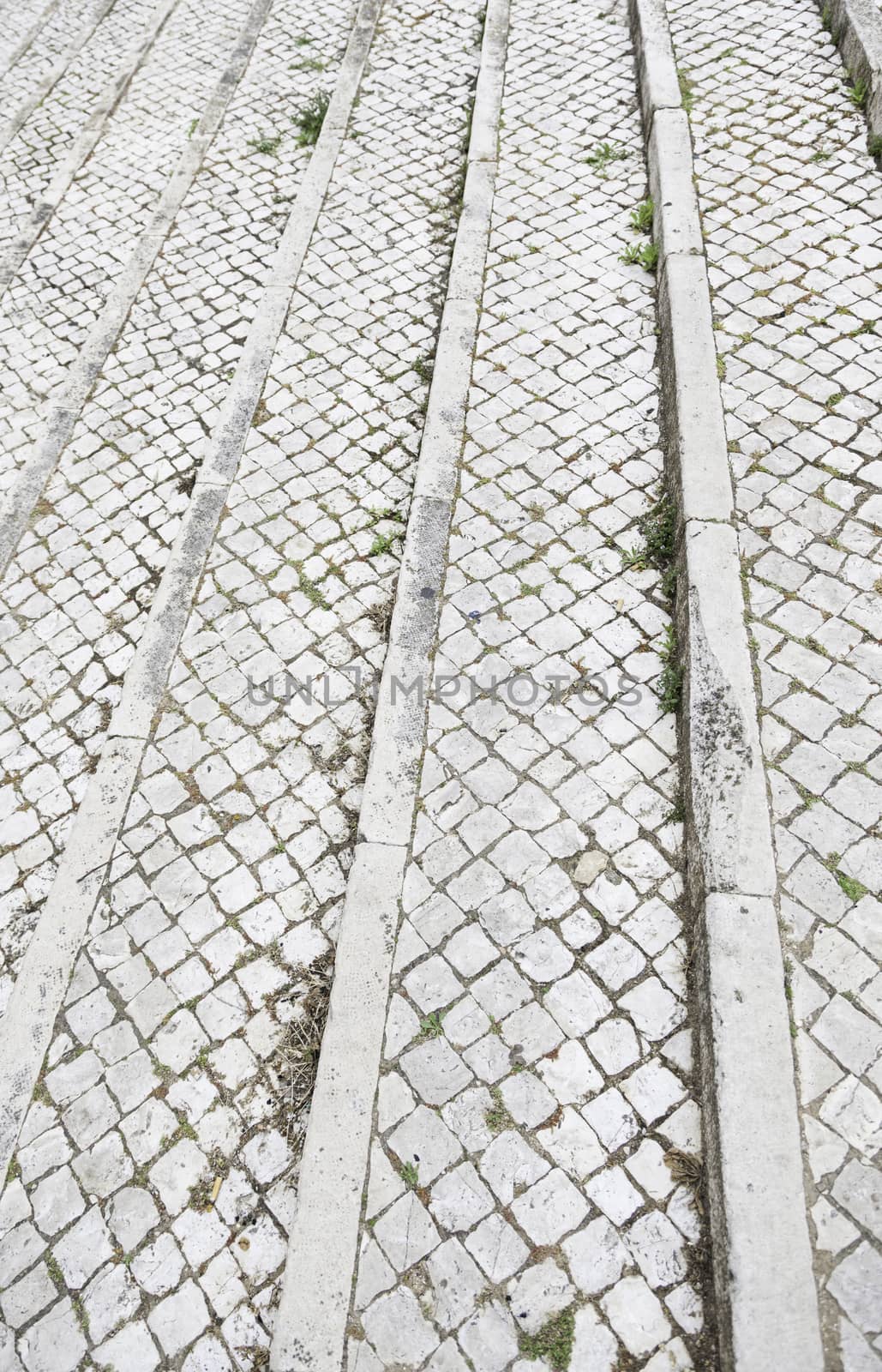Typical stone floor Lisbon, detail of a typical floor with shapes and drawings, art Portugal, tourism