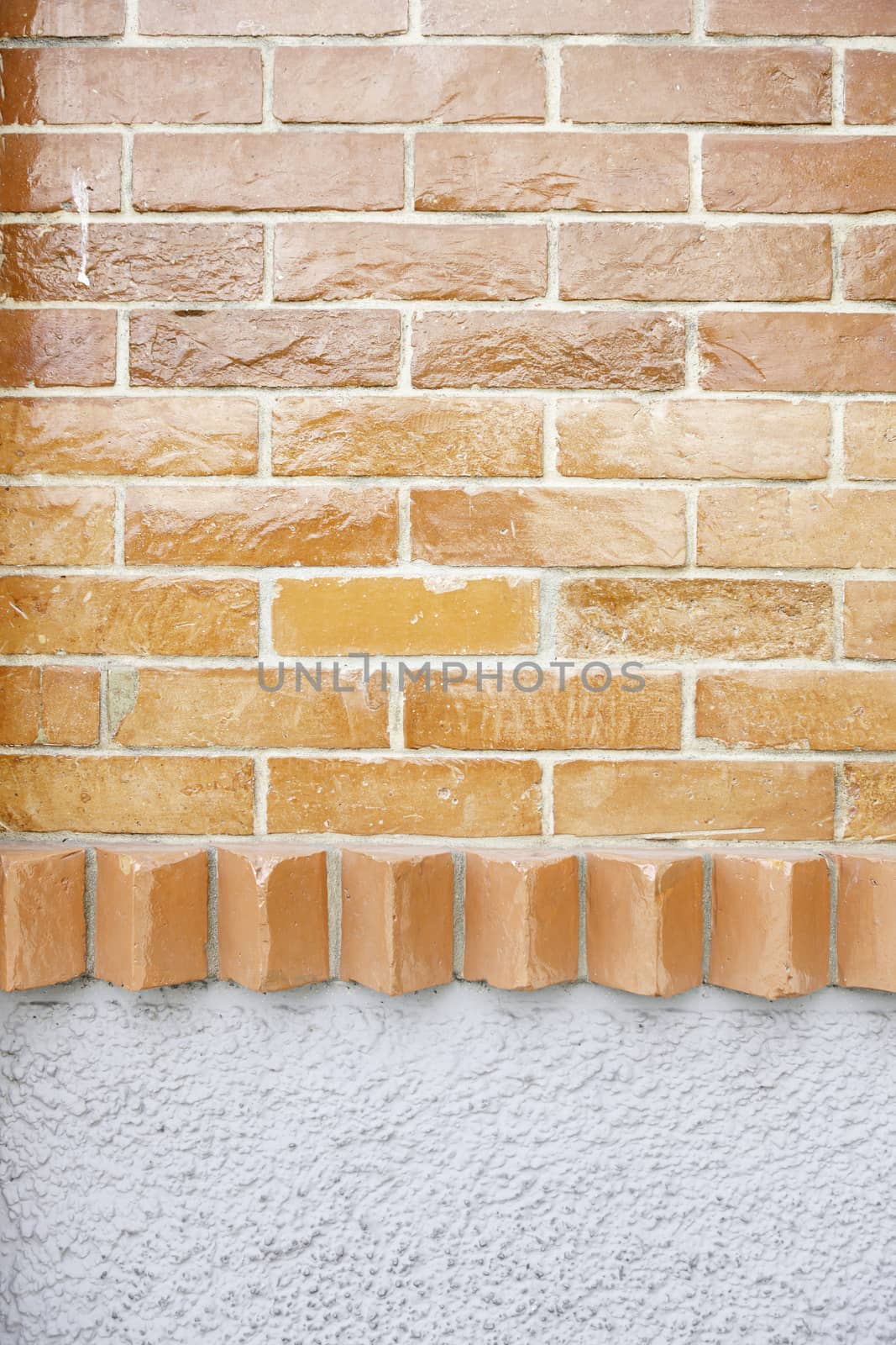 Brick wall texture, detail of a wall decorated with painted brick wall of a facade