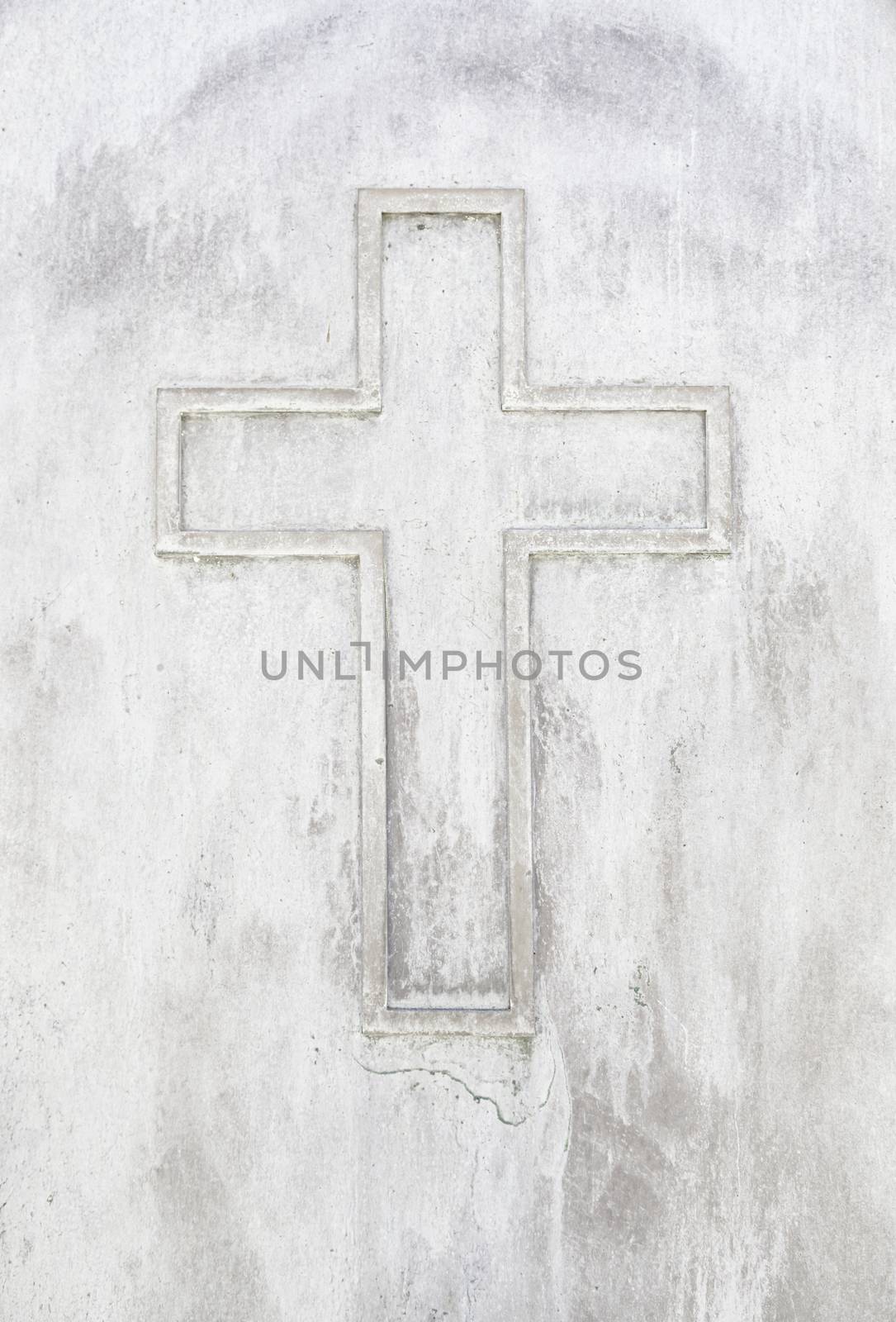 Old rusty metal cross, detail of an old cross on a metal wall, cemetery