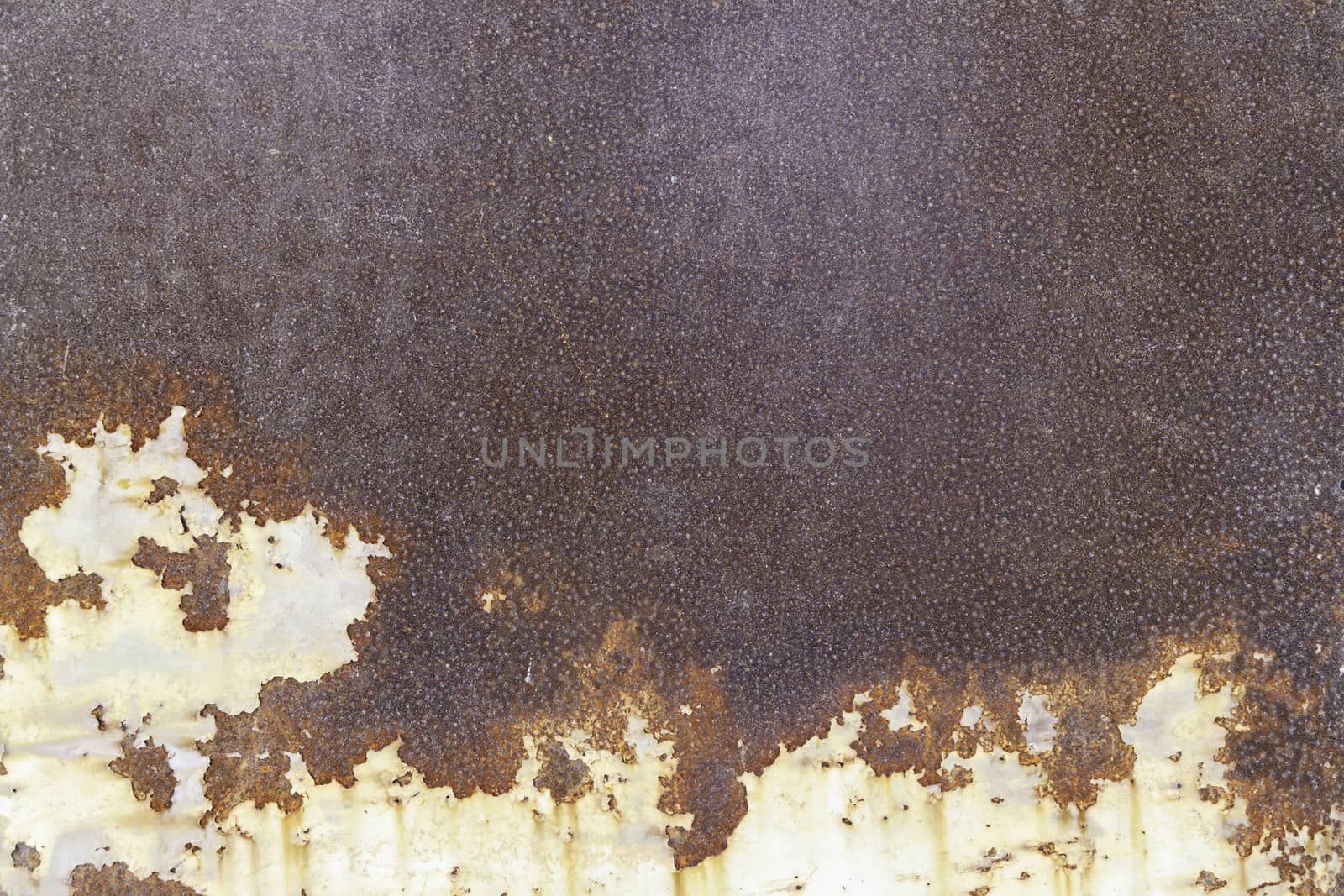 Rusty metal wall, detail of an old wall abandoned and battered