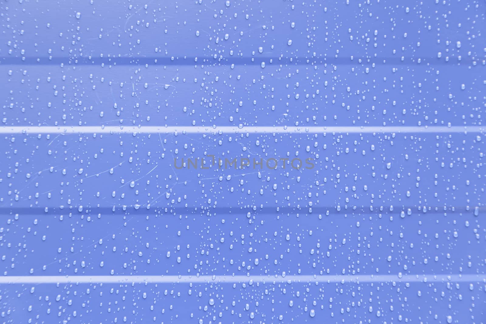 Wet Metal, detail of a metallic background wet with water, textured background