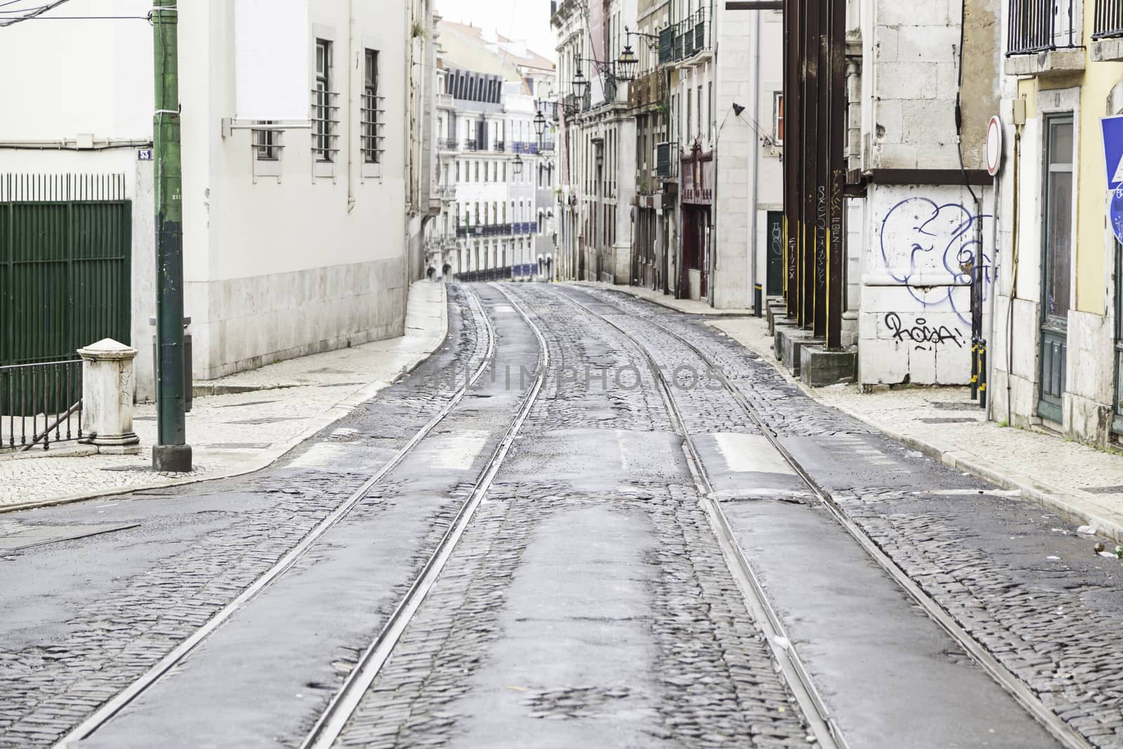 Old street of Lisbon, detail of an old area of ??the city, to tram routes in Portugal