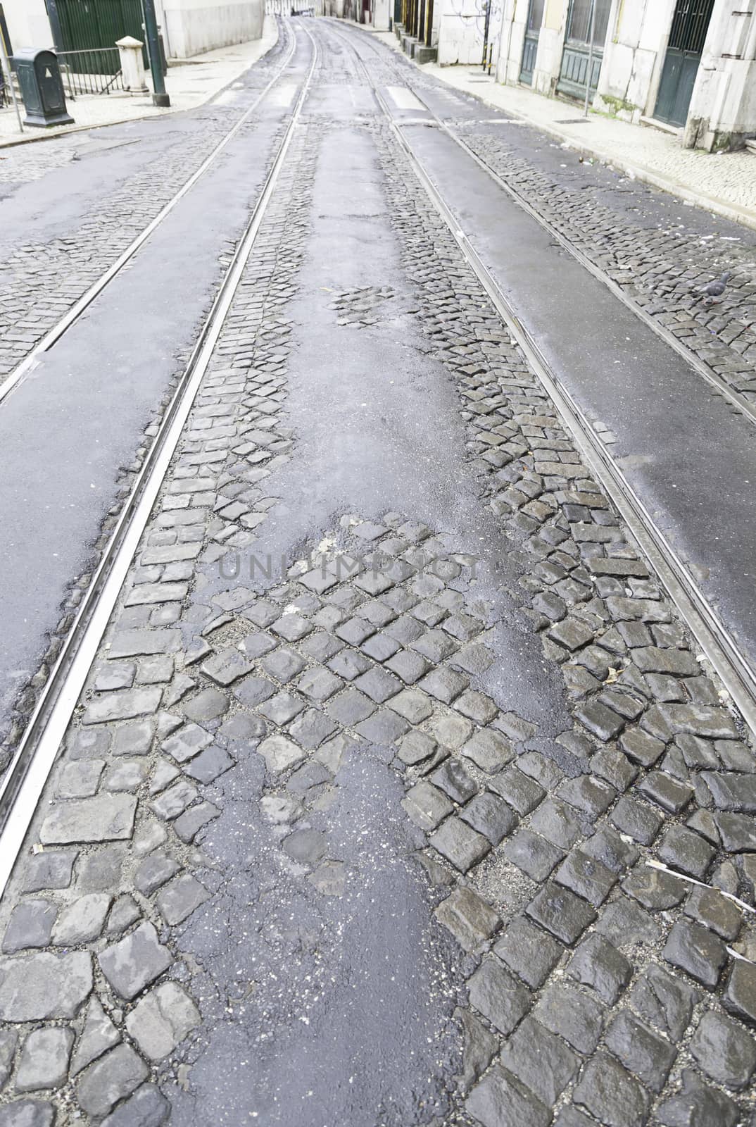 Old street of Lisbon, detail of an old area of the city, to tram routes in Portugal