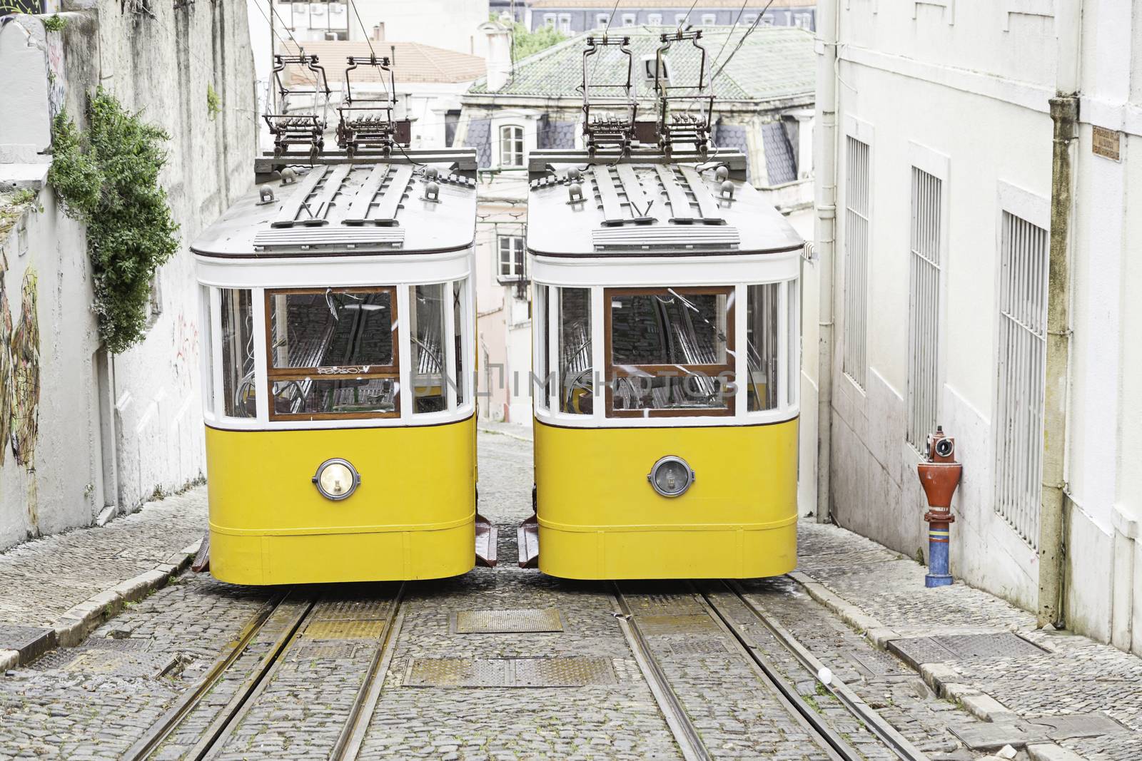 Old trams in Lisbon, detail of an old city transport, ancient art, tourism in the city