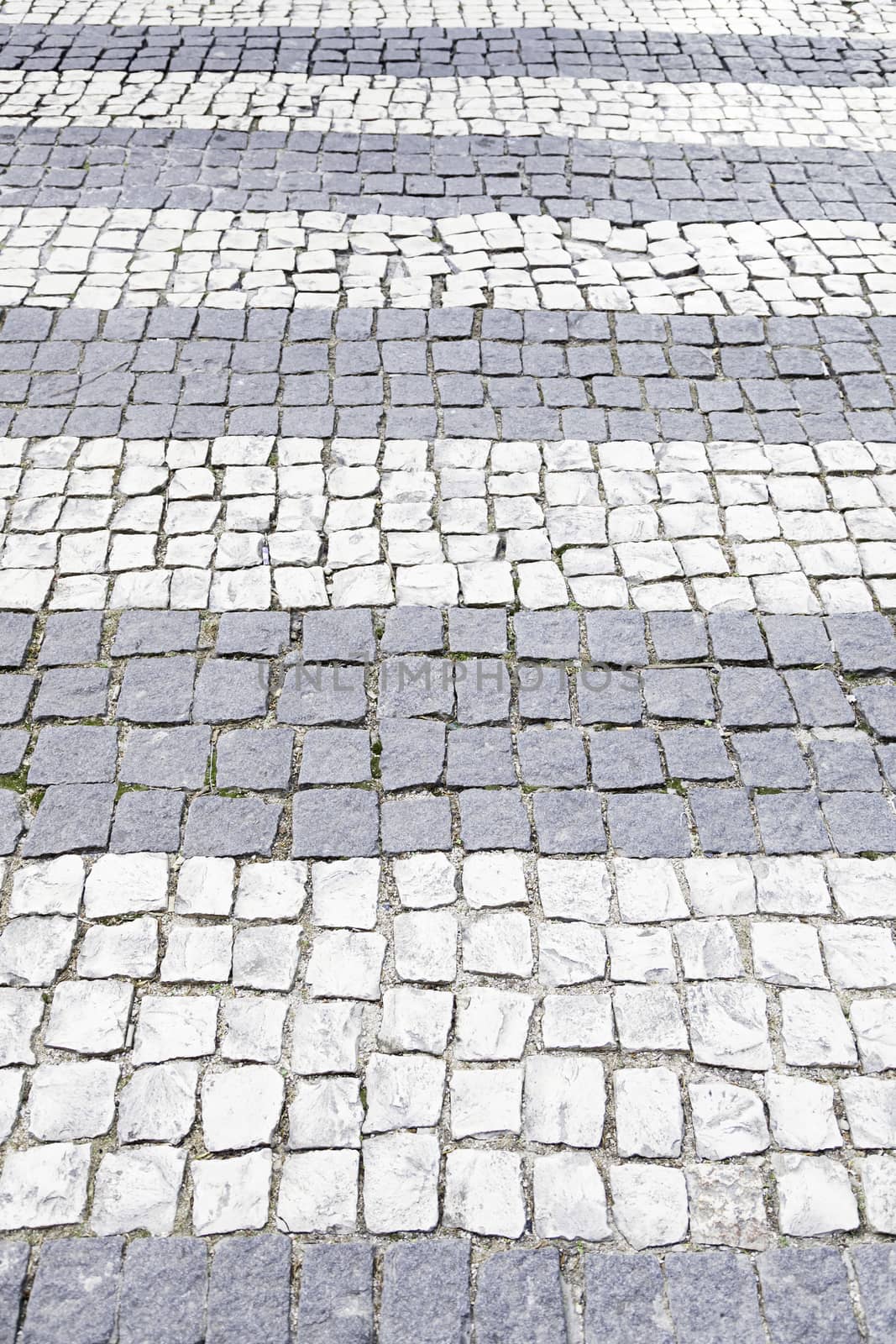 Typical stone floor Lisbon, detail of a typical floor with shapes and drawings, art Portugal, tourism