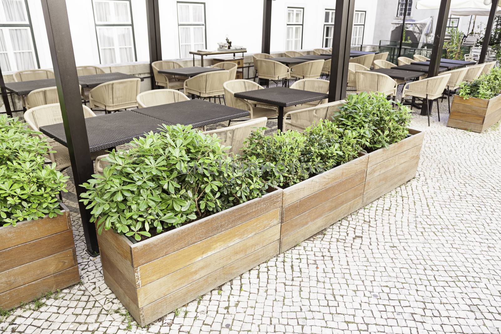 Terrace of a bar in the street, a detailed tables and chairs of a bar