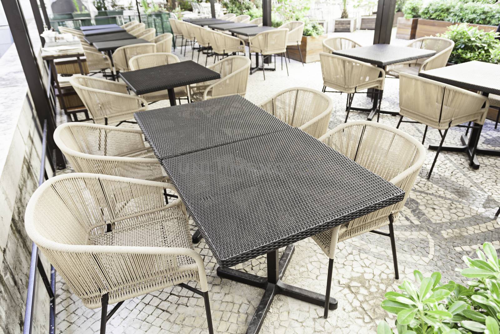 Terrace of a bar in the street, a detailed tables and chairs of a bar