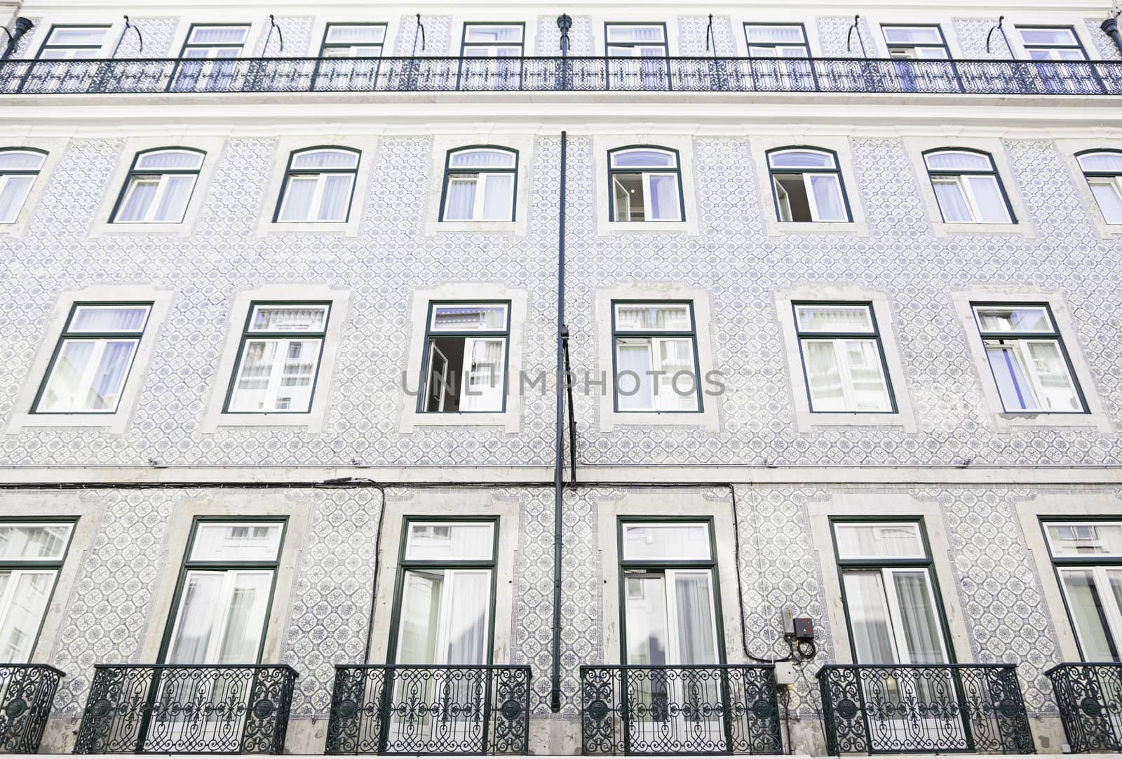Typical facade tiles in Lisbon, facade detail of an ancient decorated