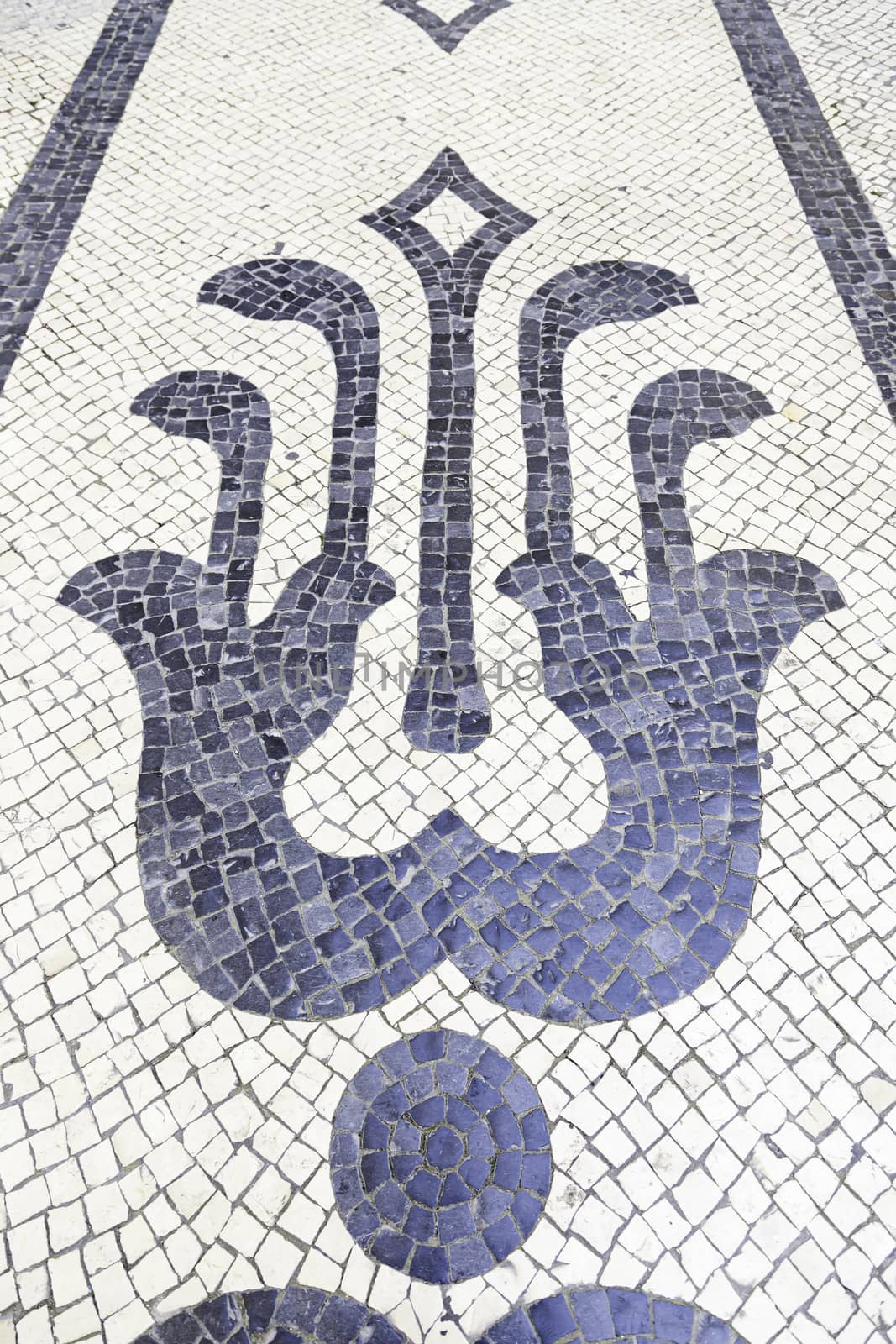 Typical stone floor Lisbon, detail of a typical floor with shapes and drawings, art Portugal, tourism