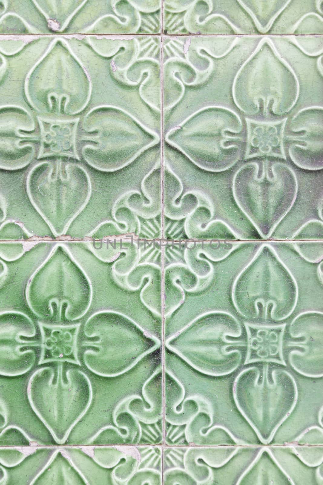 Lisbon typical green tiles detail of a typical wall decoration in Portugal