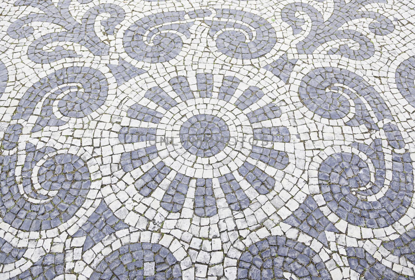 Lisbon typical mosaic, detail of a mosaic in an old typical Lisbon street, urban art