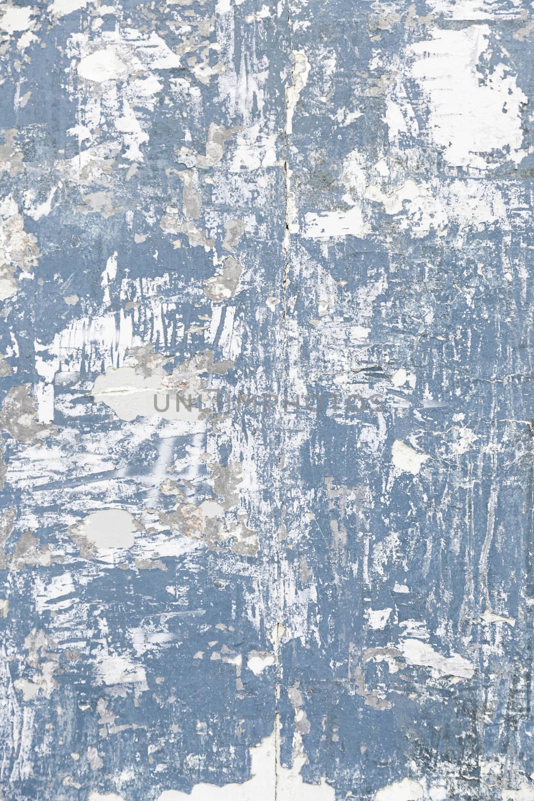 Battered and peeling wood, detail of an old wall abandoned broken