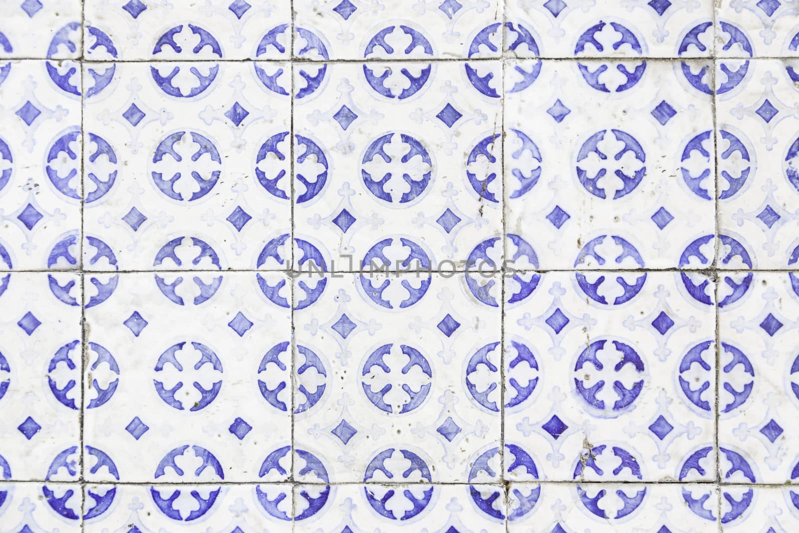 Typical old Lisbon tiles, detail of a classic ceramic tiles, art of Portugal