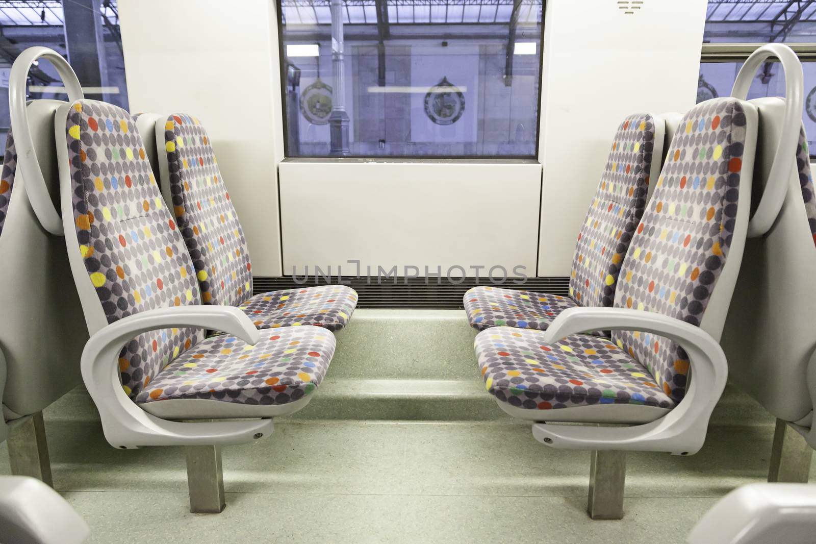 Seats on a train, detail of a new public transport, modernity and progress