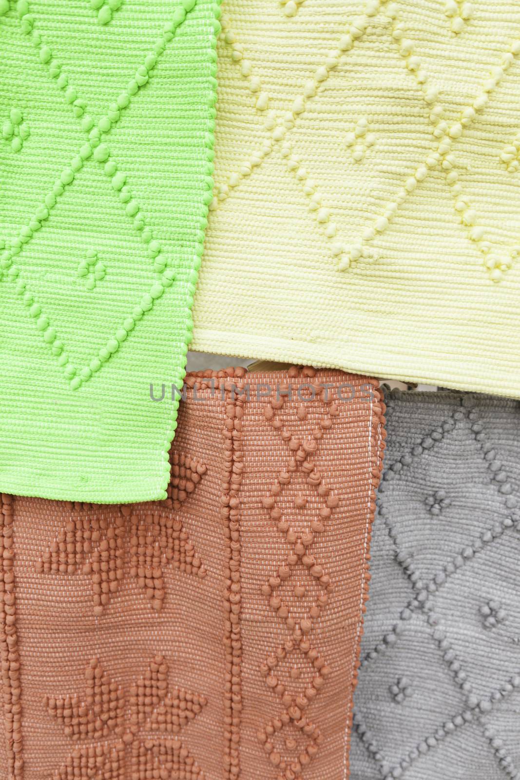 Colored rags, handmade fabric detail at a store, textured background