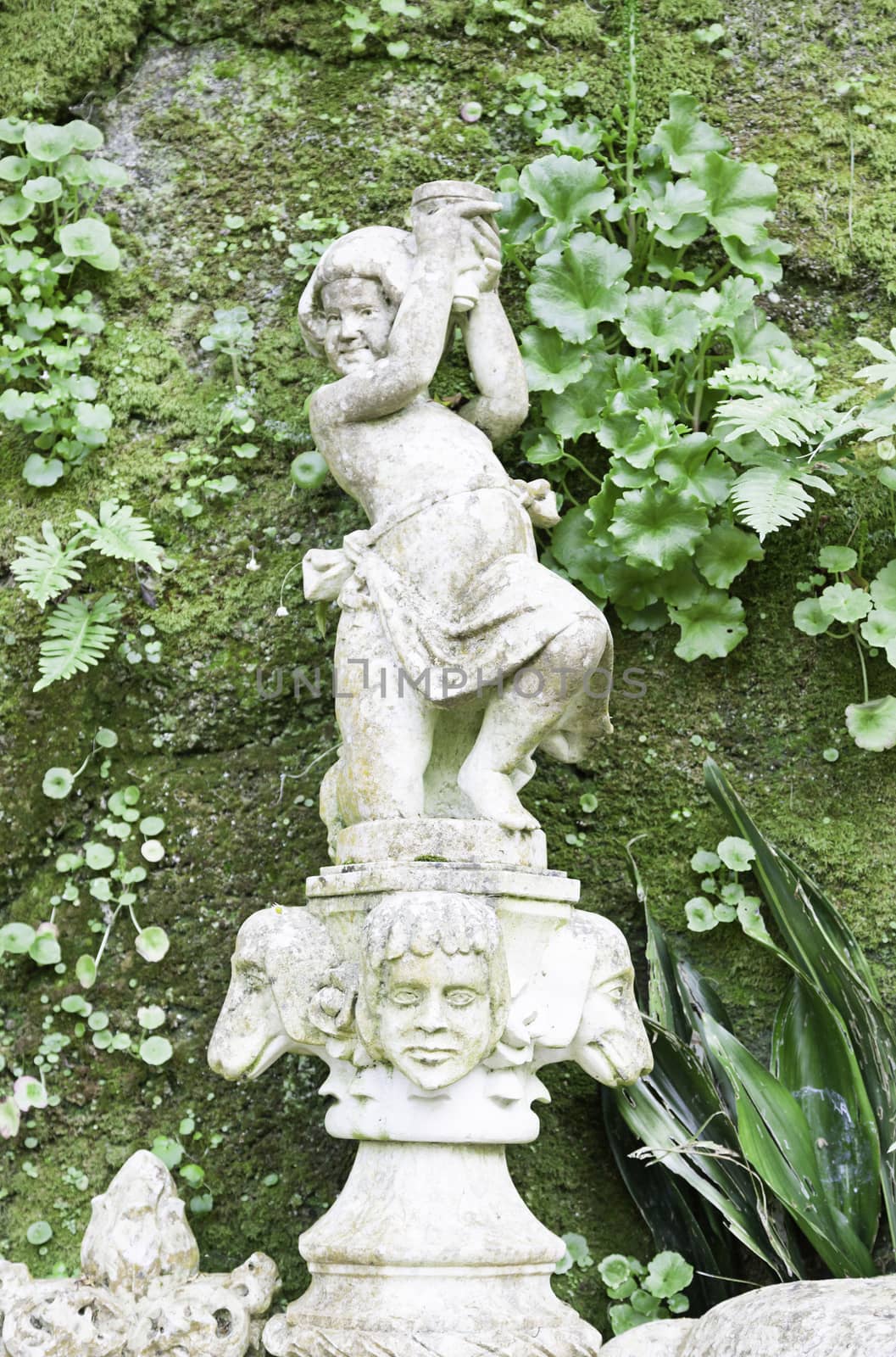 Stone statues in a garden in Sintra by esebene