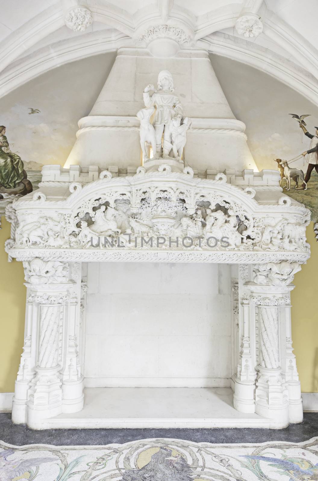 Old stone fireplace decorated interior detail of a monuento, ancient architecture