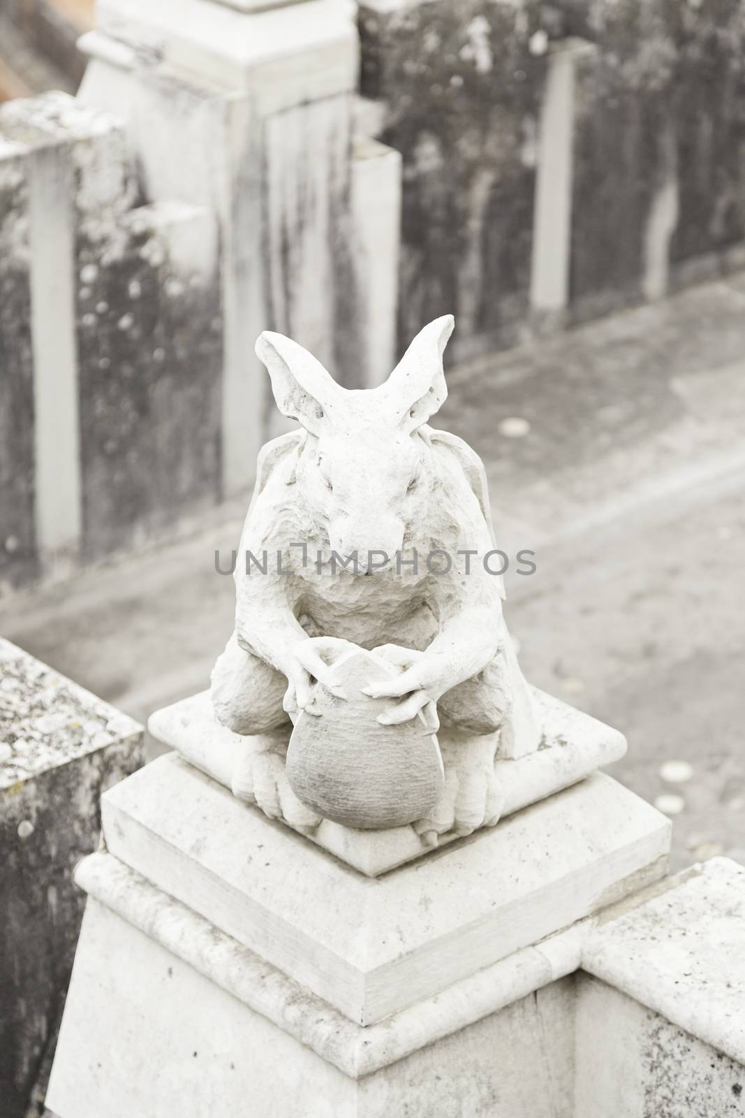 Old gargoyle shaped rabbit closeup of a figure of old rabbit