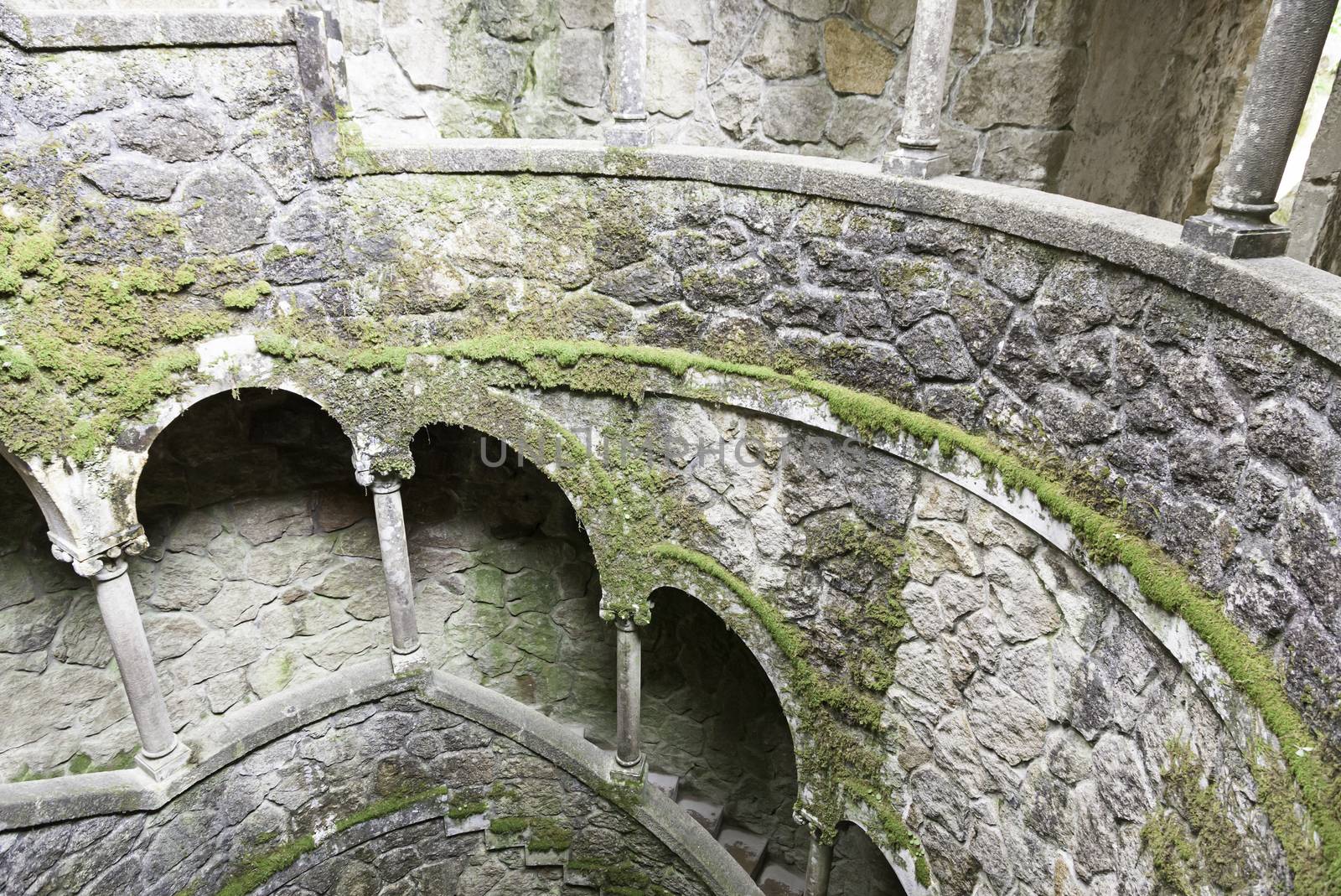 The Initiation well of Quinta da Regaleira in Sintra, Portugal. It's a 27 meter staircase that leads straight down underground and connects with other tunnels via underground walkways. 