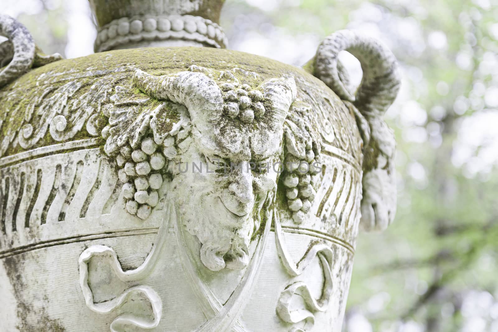 Vase with detail of a goat, old stone object, classical art