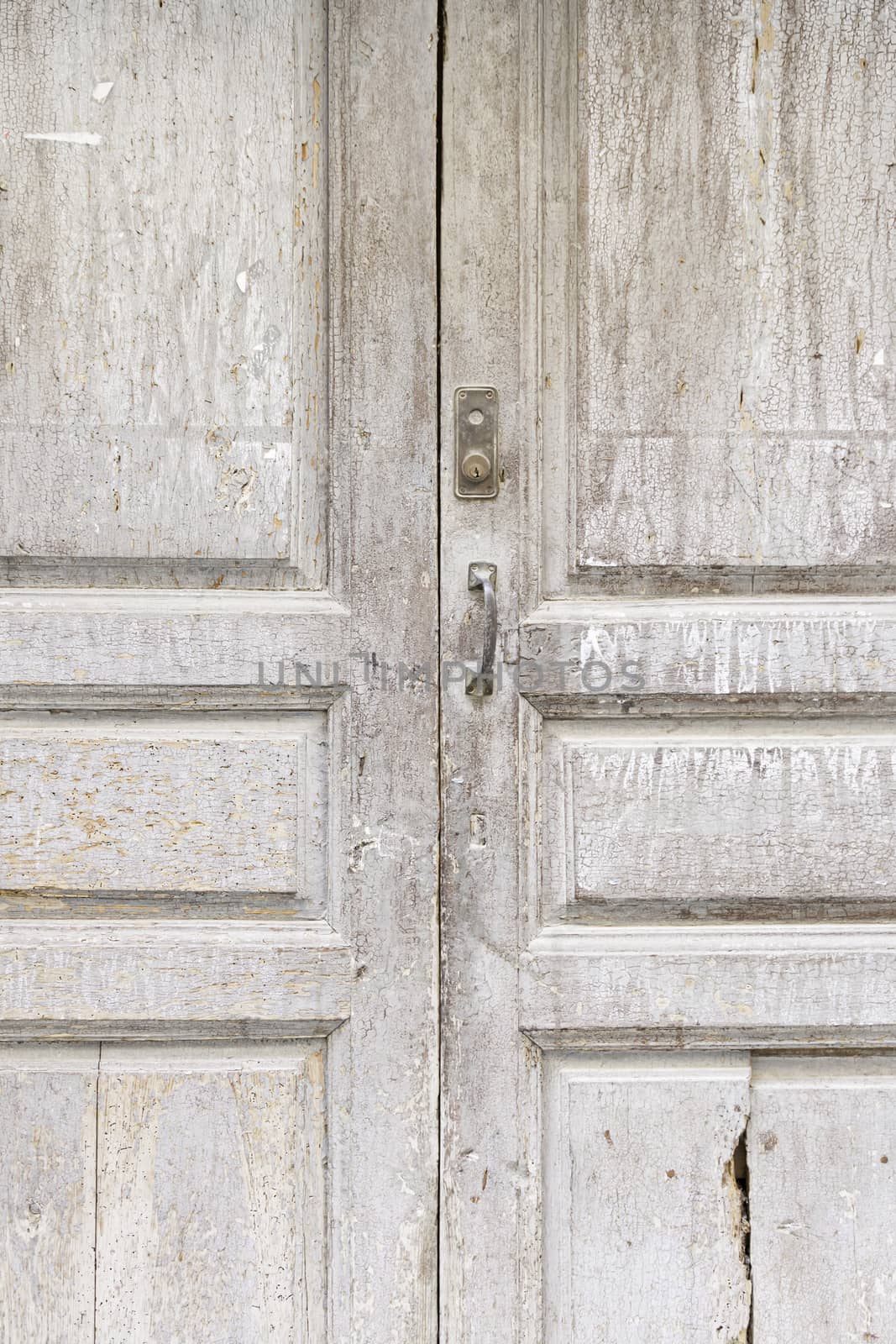 Old wooden door detail of a decorated wooden door, protection and decoration