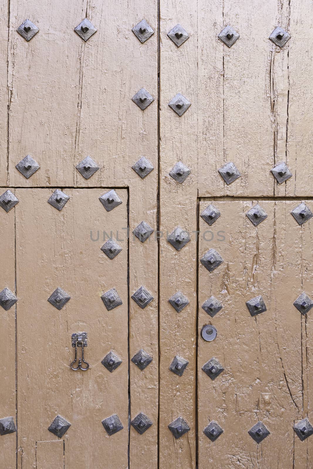 Abandoned wooden old door, detail of a door in the city, neglect and ruin, antique