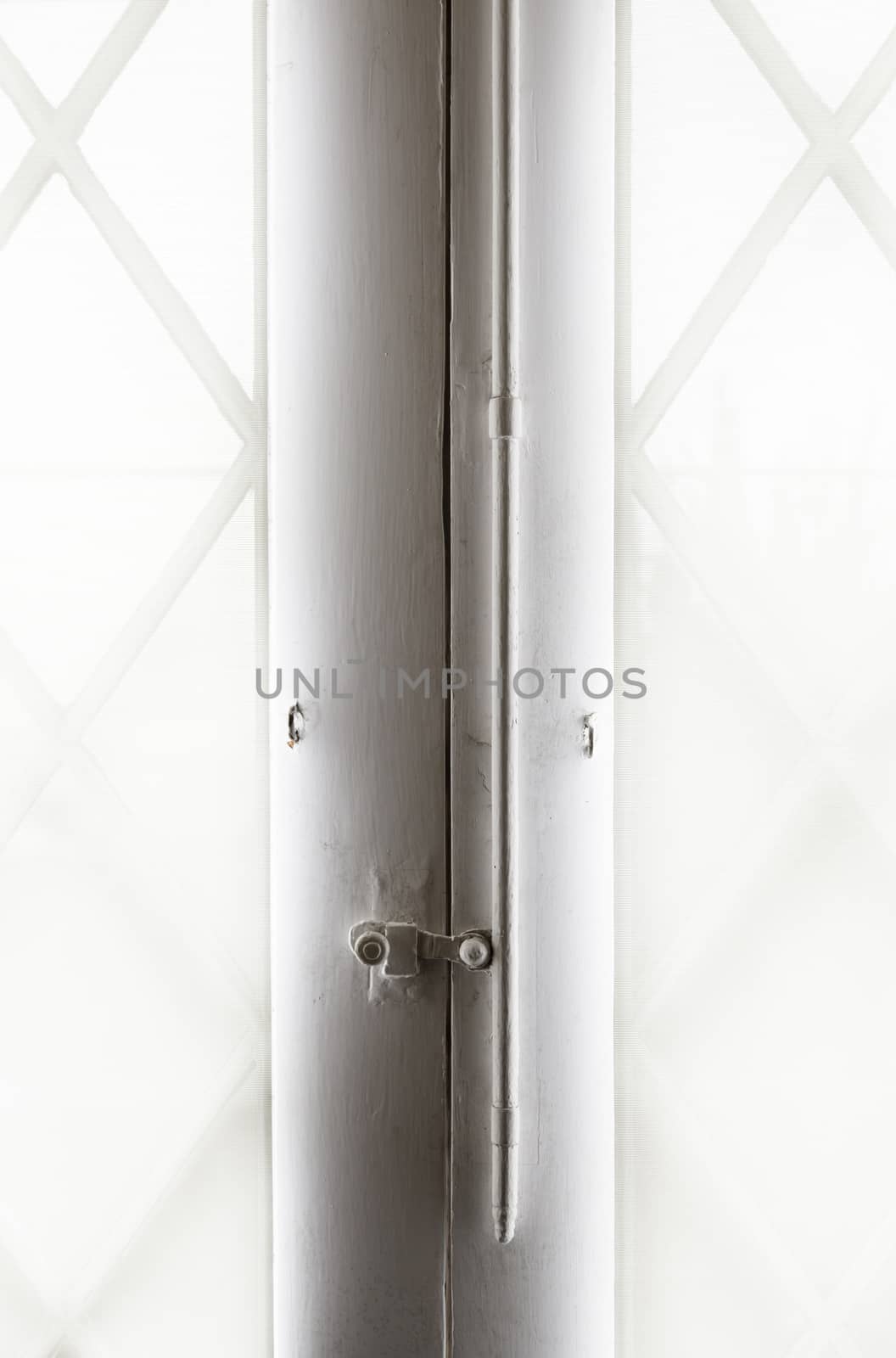 White glass window detail of the entry of light through a window, exterior views