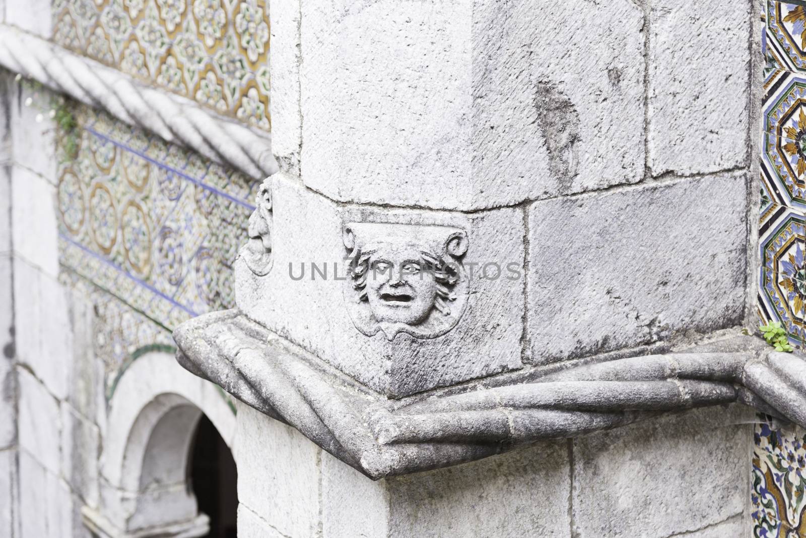Gargoyle in Sintra Pena Palace, detail of an old heritage of humanity building, tourism in Portugal