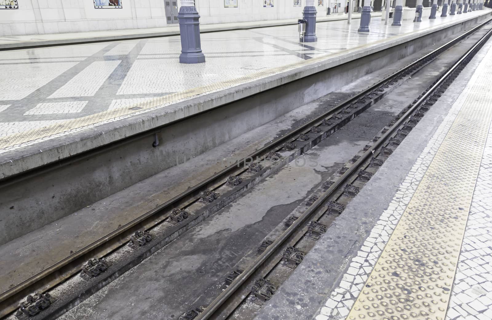 Railroad tracks at a station, detail of a train station, public transport
