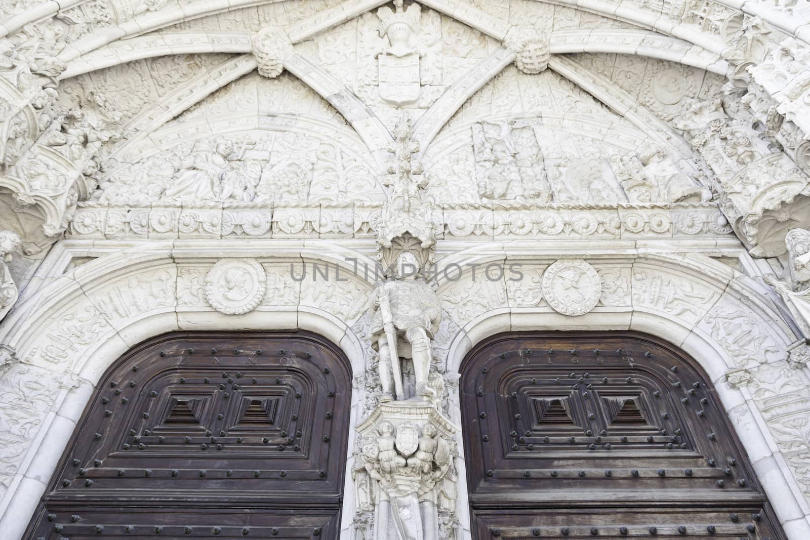 Facade of Jeronimos in Lisbon, detail of old building in Portugal, Manueline architecture