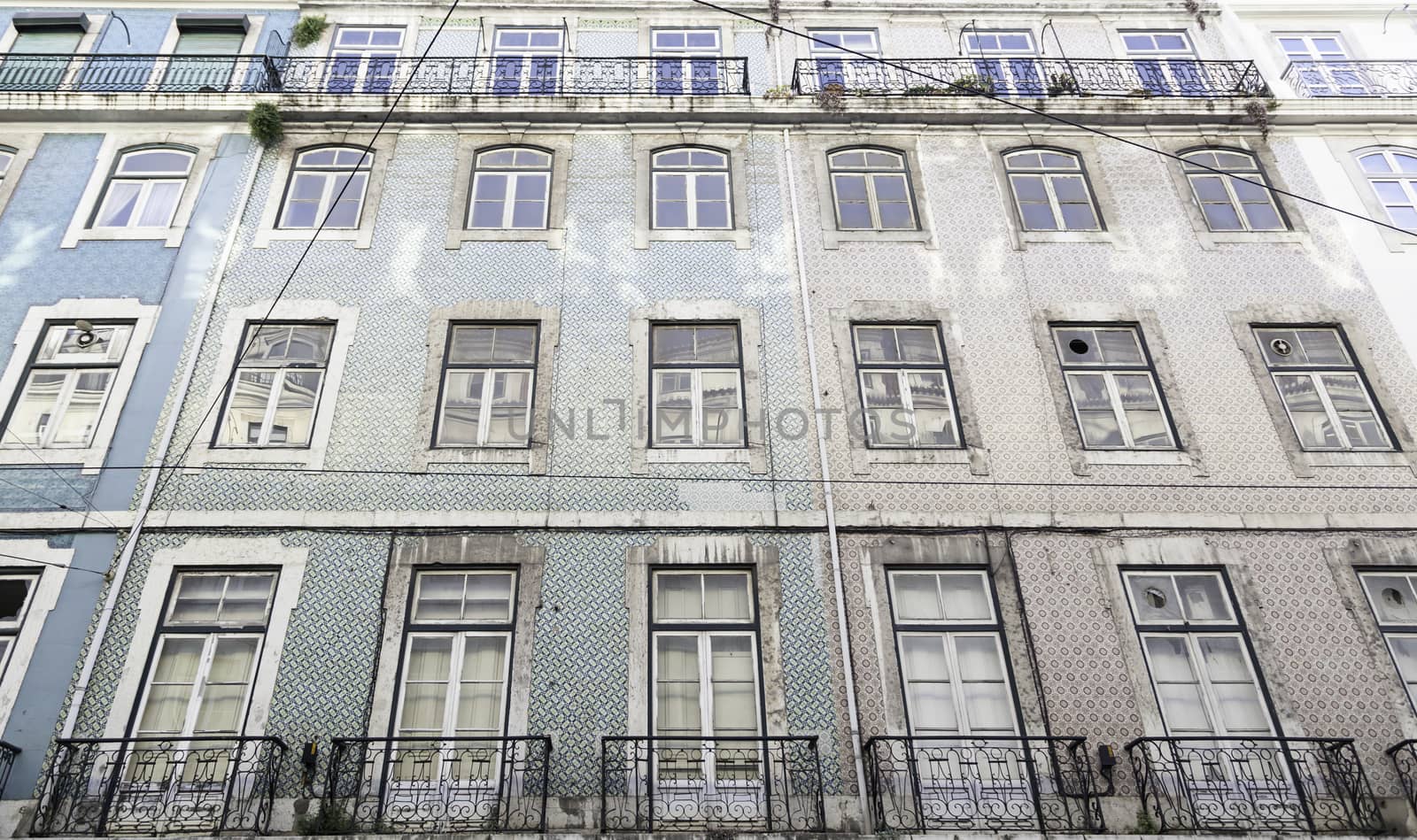 Typical facade tiles in Lisbon, facade detail of an ancient decorated