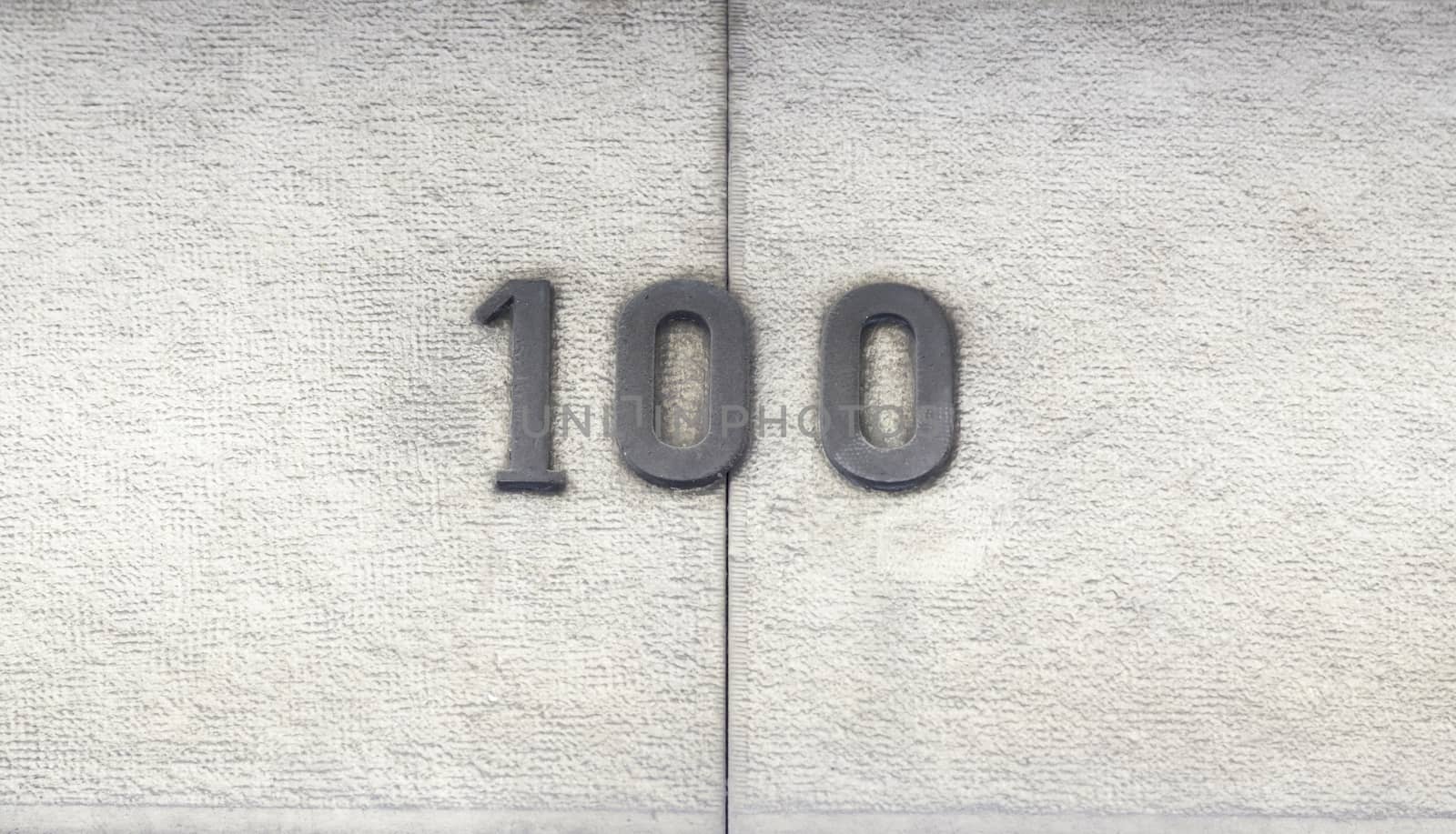 Number hundred in a house, a number of detailed information on the facade of a house