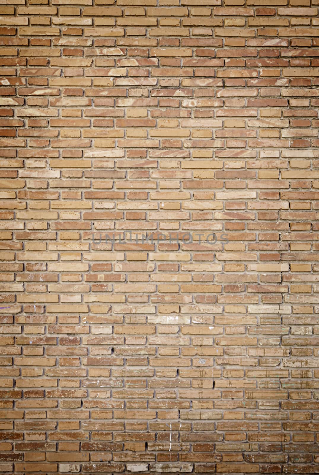 Dirty brick wall, detail of a dirty brown brick wall and abandoned building facade and