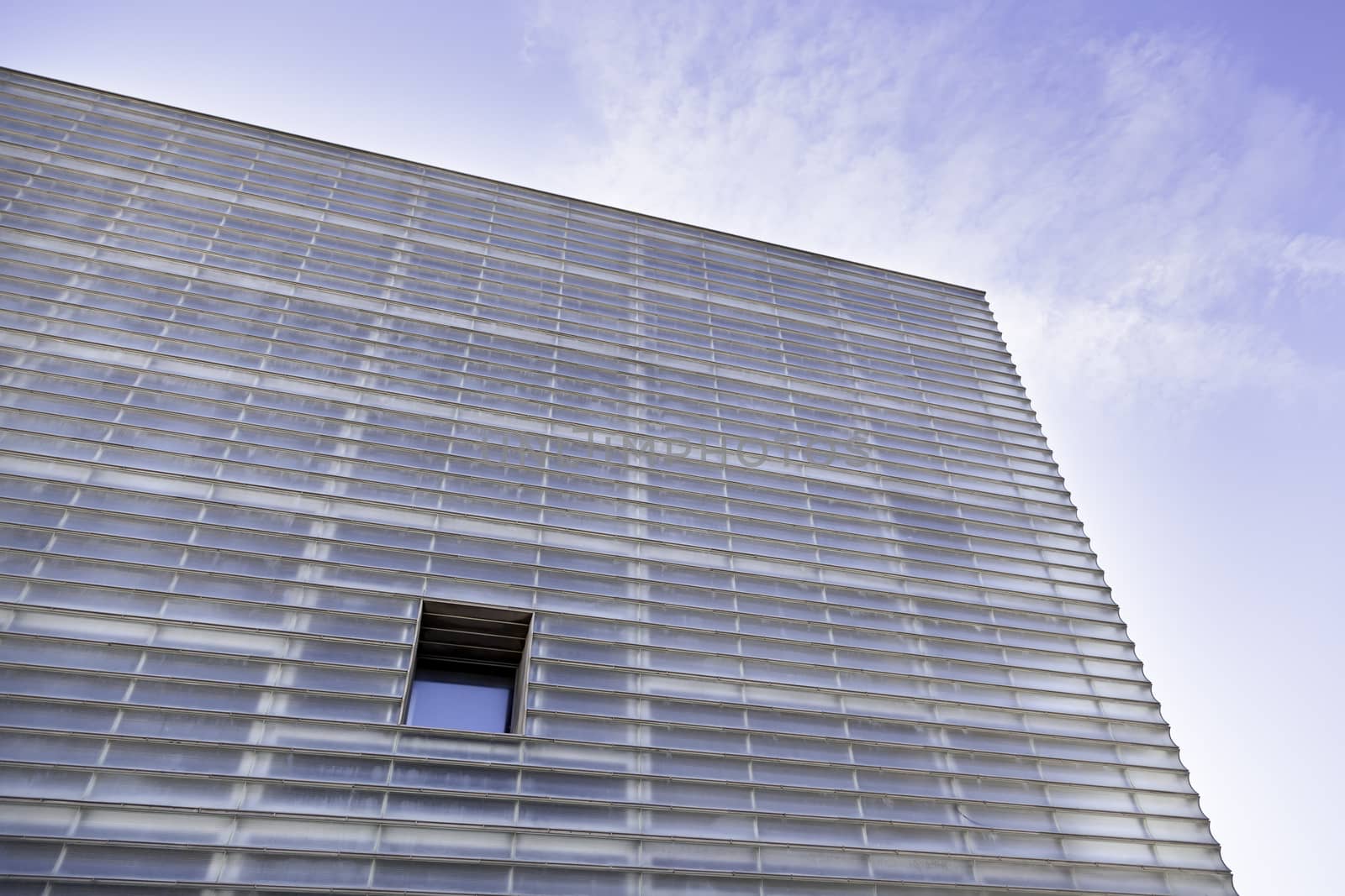 Modern windowed building, detail of a facade in the city, modern architecture