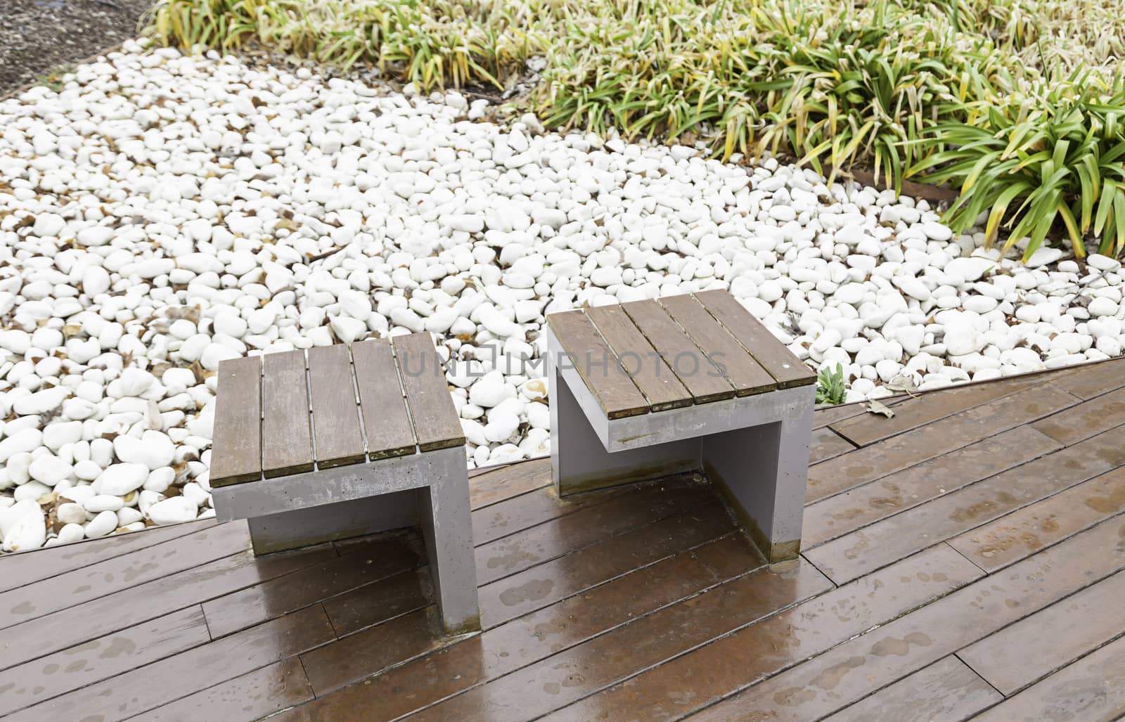 Banks in an oriental garden, detail of benches to rest in a zen garden, oriental decoration