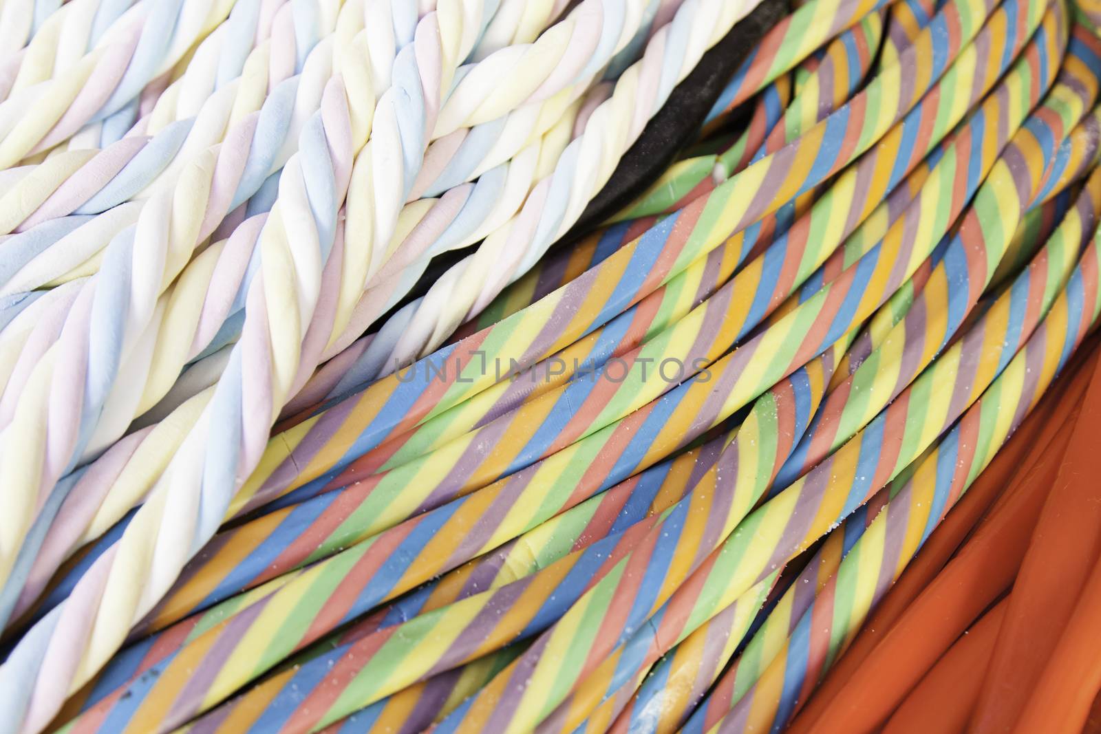 Liquorice flavored colors, detail of a traditional market goodies, sweets and sugar