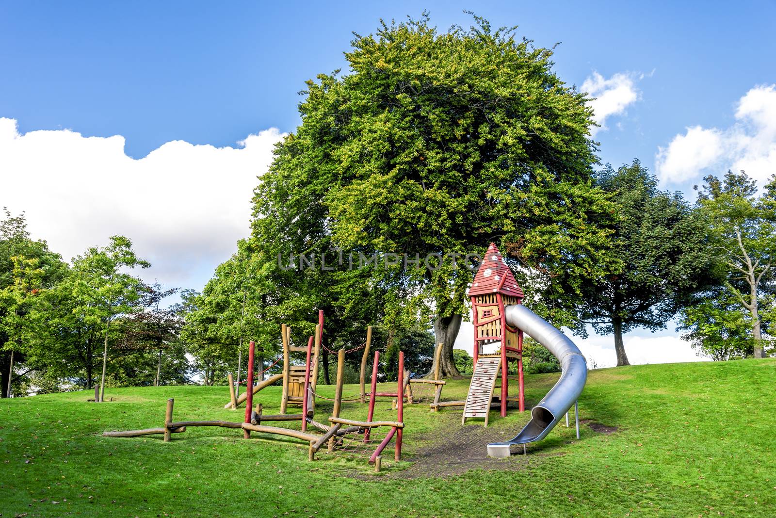A small obstacle course and a tall magic house with a tube slide in Duthie Park, Aberdeen, Scotland