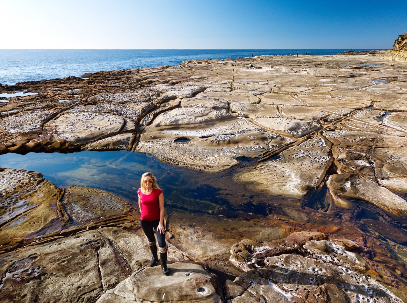 Standing in an eroded coastal landscape by lovleah